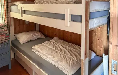 a couple of bunk beds in a room at 3 Bedroom Awesome Home In Vikersund in Vikersund