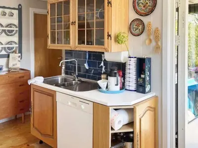 a kitchen with a sink and a counter top at 4 person holiday home in Svelgen-By Traum in Sørgulen