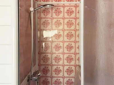 a shower in a bathroom with a tile wall at 4 person holiday home in Svelgen-By Traum in Sørgulen