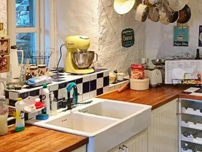 a kitchen with a sink and a mixer on a counter at 8 person holiday home in Bruvik-By Traum in Bruvik