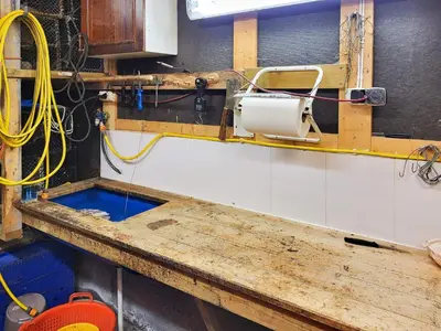 a kitchen with a wooden counter top in a room at 6 person holiday home in Tansøy-By Traum in Tansøy