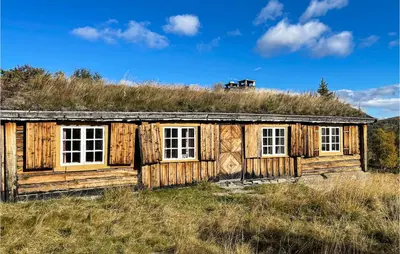an old log cabin with a grass roof at 3 Bedroom Nice Home In Kvam in Kvam