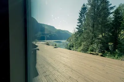 a view from a train window of a wooden road at Modalen Fjord Cottage in Mo
