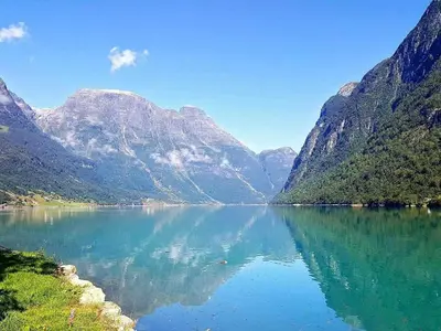 a view of a lake with mountains in the background at 4 person holiday home in Oldedalen-By Traum in Briksdalsbre