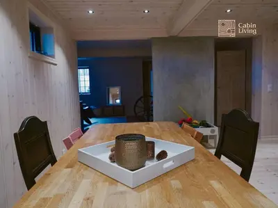 a dining room table with a bowl on top of it at Large cabin at Nesfjellet with lovely view, inddor Jacuzzi & sauna in Nes i Ådal