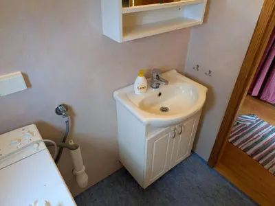 a bathroom with a sink and a toilet at 4 person holiday home in HARDBAKKE-By Traum in Hardbakke