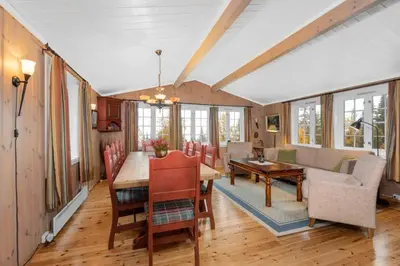 a dining room with a table and chairs at Trysilfjellet in Trysil