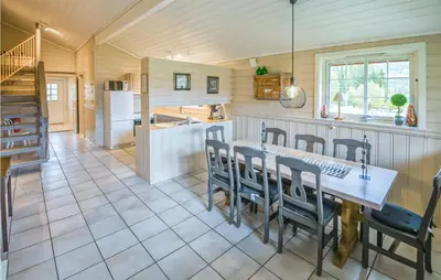 a kitchen and dining room with a table and chairs at Gorgeous Home In Hemsedal With Sauna in Hemsedal