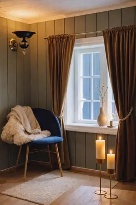 a room with a chair and a window and two candles at Traditional timber farm with Sauna & Wi-Fi in Baukål