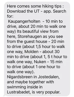 a text message from a phone with a bunch of numbers at Gjestehus i Sogndal med utsikt over fjord og fjell in Sogndal