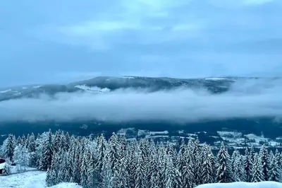 a view of a city in the snow at New ski in-out apartment with sauna in Hafjell in Øyer