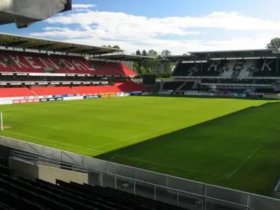a view of a soccer stadium with a green field at Fully equipped independent apartment near NTNU,Lerkendal og center in Trondheim