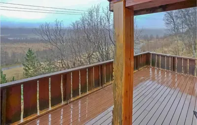 a balcony with a view of the woods at Awesome Home In Hemsedal With Wifi in Hemsedal