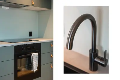a kitchen with a sink and a faucet at Odda View - 4BR & 2BR & 1BR - B11 in Odda