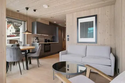 a living room with a couch and a table at Wangen Apartments in Aurland