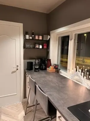 a kitchen with a large counter top in a room at Skogro ved Norefjell in Noresund