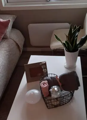 a coffee table with a basket on top of it at Adorable 1-bedroom apartment with a fantastic view - Free Parking in Trondheim