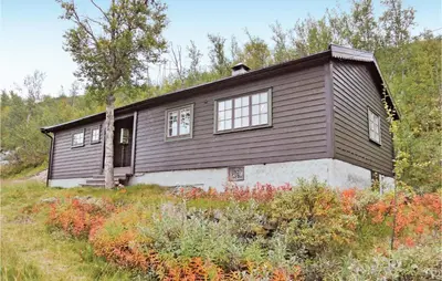 a small house on top of a hill at Holiday Home Haugastøl Xxxix in Haugastøl