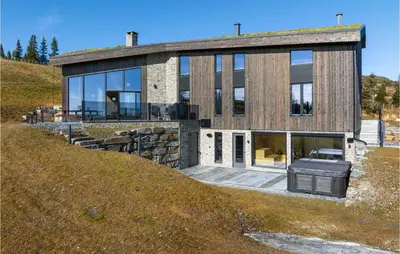 a house on the side of a hill at Stunning View In Holiday Home in Gol