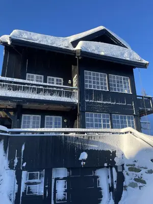 a house with snow on the roof of it at Geilo-Kikut, Ski-In, Ski-Out with Stunning Trails and Perfect Location in Geilo