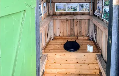 an inside view of a chicken house with a toilet at Cozy Home In Vinstra With Kitchen in Vinstra