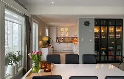 a kitchen and dining room with a table and chairs at Awesome Home In Olden With Wifi in Olden