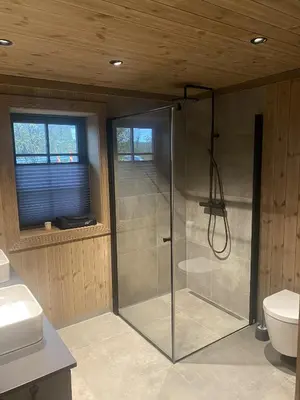a glass shower in a bathroom with a toilet at New mountain lodge - Geilo-Kikut - Great location in Geilo