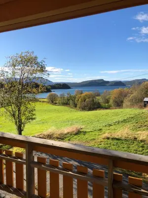a view from the deck of the lake from the house at Nye Heimen Overnatting in Namsos
