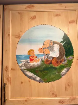 a picture of a painting of a bear and a child at Perlen på solheim I Hyen in Vereide