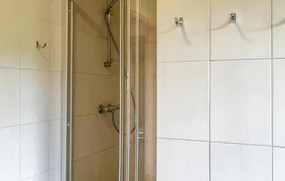 a shower with a glass door in a bathroom at Stunning Home In Gol With Sauna in Gol